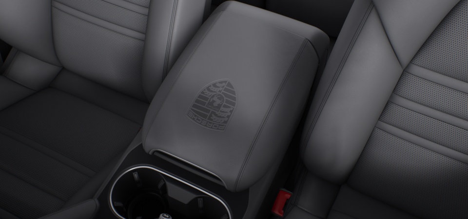 Porsche Crest embossed on centre console armrests