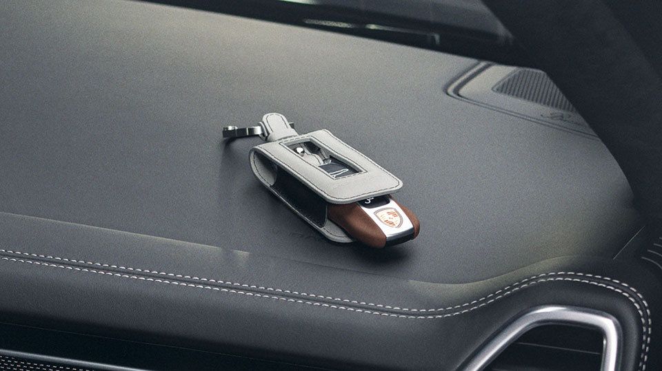 Vehicle key leather with key pouch leather