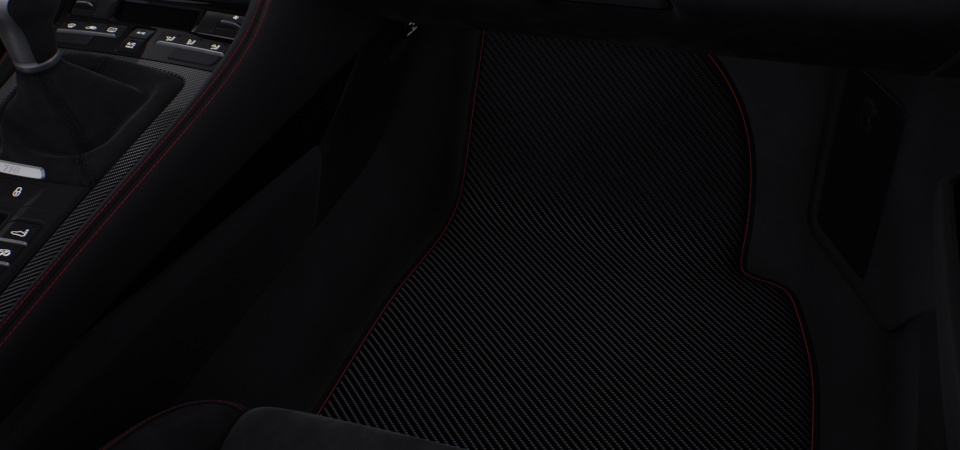 Floor mats in carbon with leather edging
