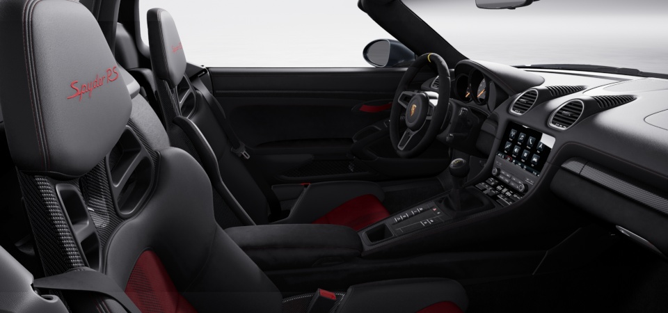 Leather interior with extensive items in leather and Race-Tex, in Black-Carmine Red