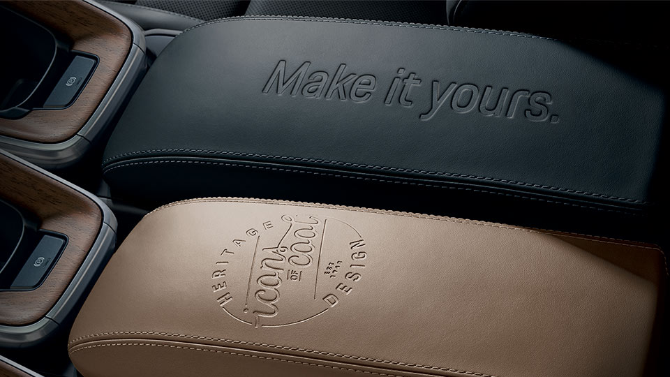 Bespoke Embossing on Center Console Storage Compartment Lid