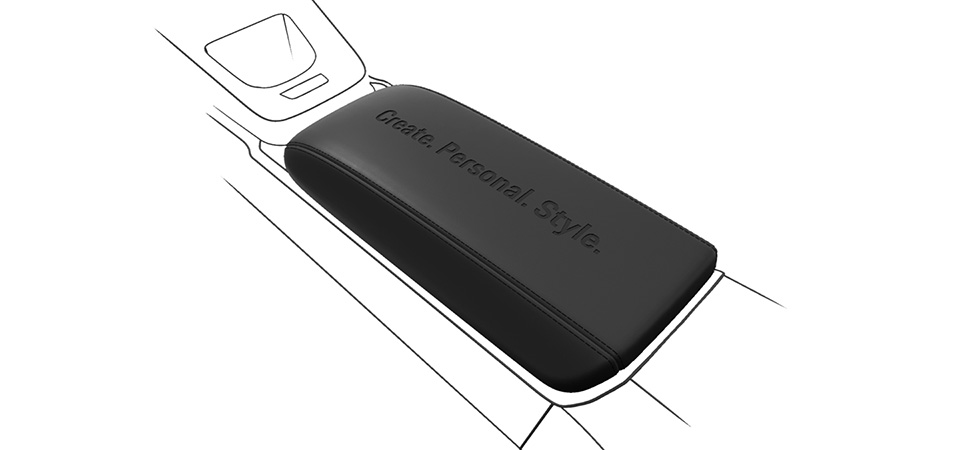 Gaufrage sur mesure sur le couvercle du compartiment de rangement de la console centrale