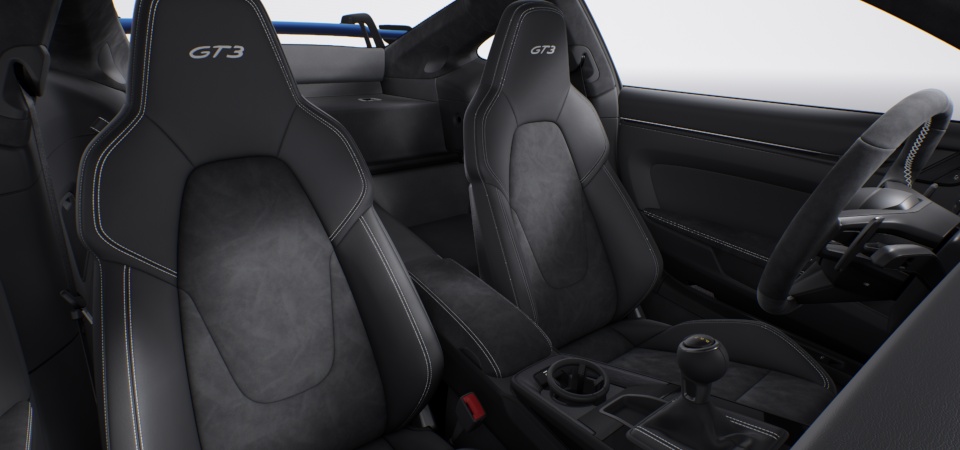 Interior con elementos de cuero / Race-Tex en color Negro con color de contraste Plata GT