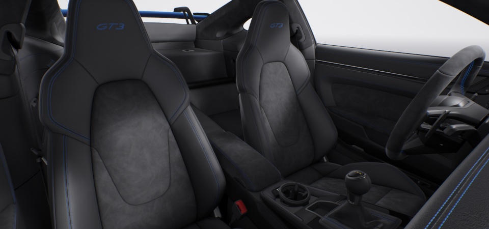Interior with extensive leather / Race-Tex items in Black with contrasting colour Shark Blue