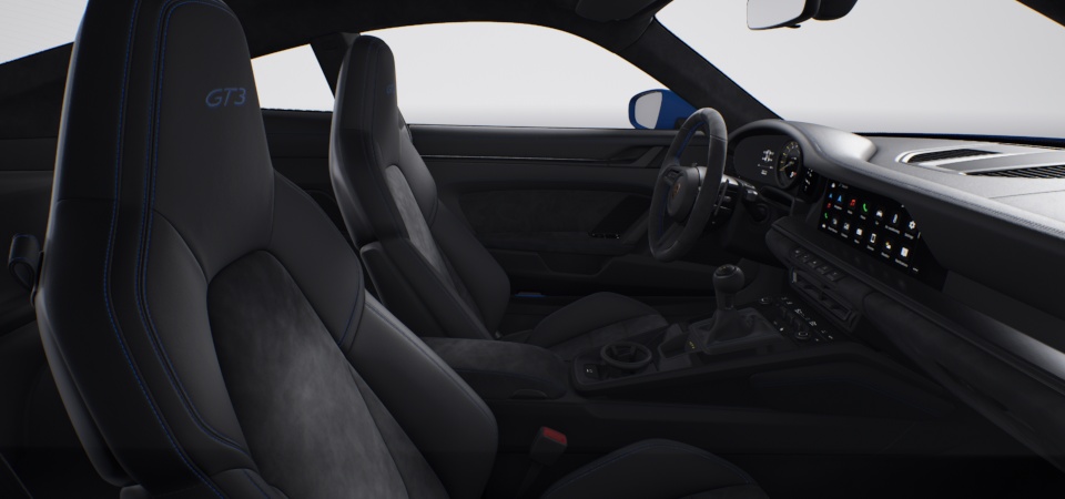 Interior with extensive leather / Race-Tex items in Black with contrasting color Shark Blue