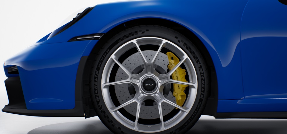 Porsche Ceramic Composite Brakes (PCCB) with Calipers in Yellow