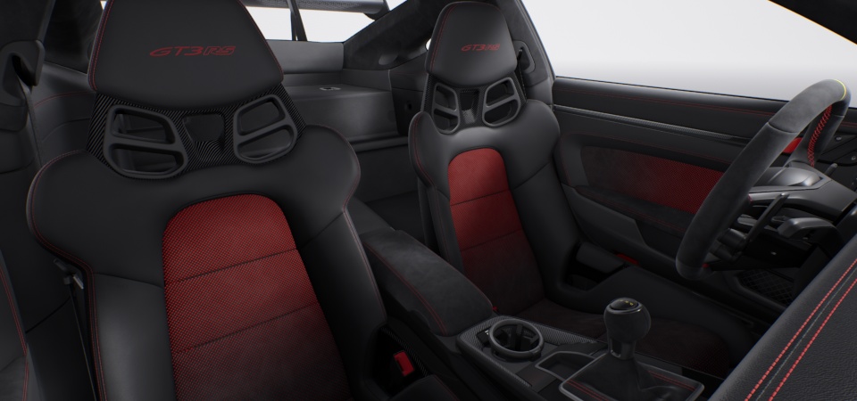 Interior with extensive leather / Race-Tex items in Black with contrasting colour Guards Red