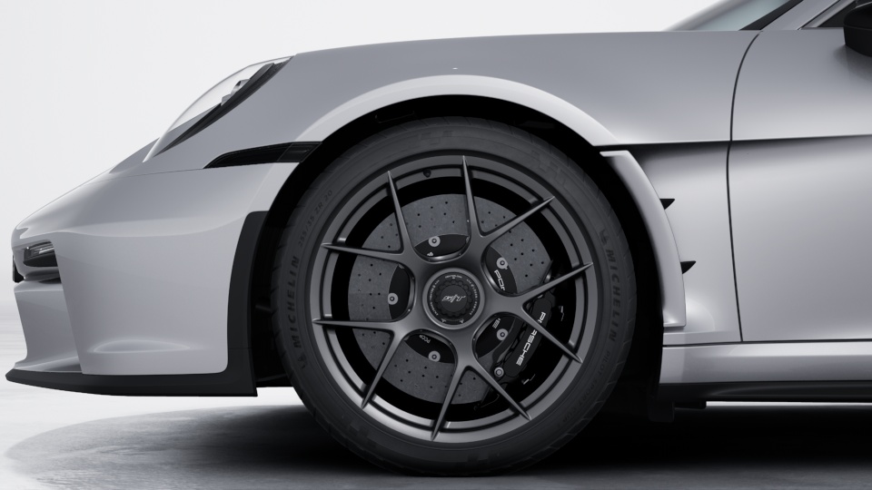 前 20 / 後 21 吋 輕量化 911 S/T 鍛造鎂合金輪圈，配備中央單一鎖定設計及高性能跑車輪胎 (Sport Tyres)