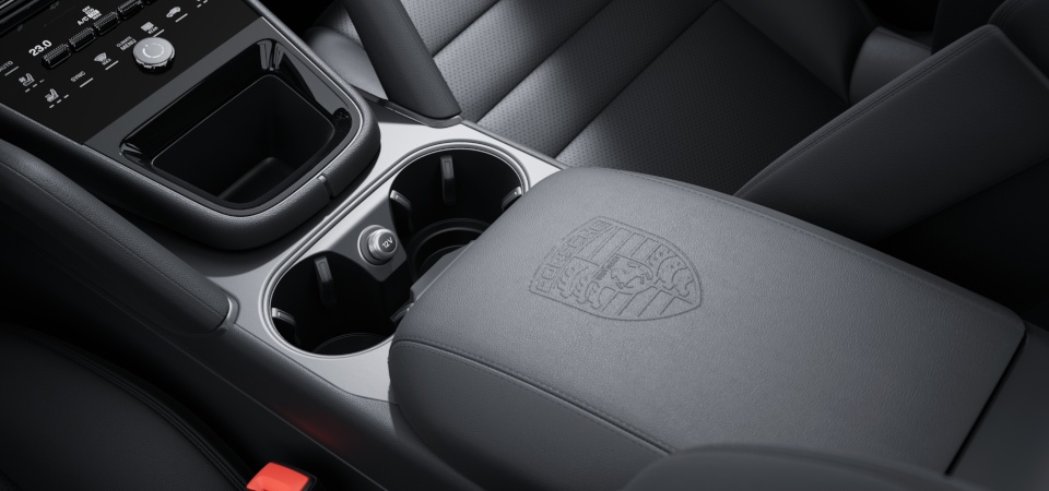 Porsche Crest embossed on centre console armrests