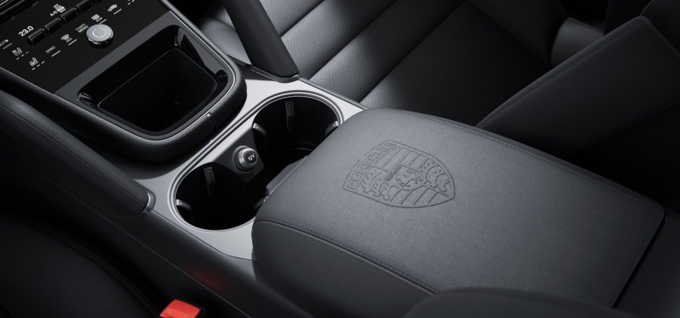 Porsche Crest embossed on centre console armrest