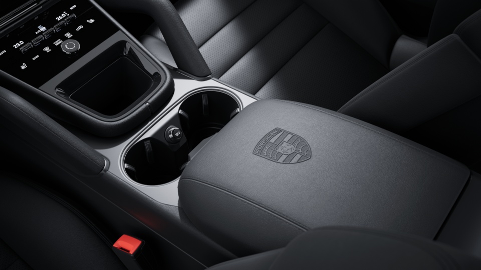 Porsche Crest embossed on centre console armrests