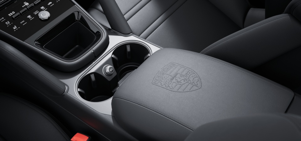 Porsche Crest embossed on centre console armrests