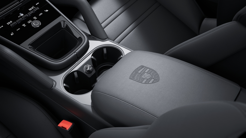 Porsche Crest embossed on centre console armrests