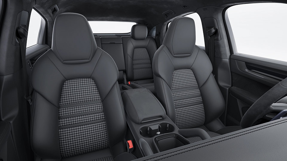 Extended leather/Race-Tex interior in Black with seat classic fabric seat centres