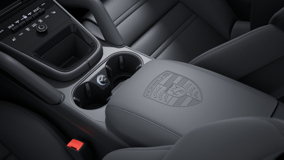 Porsche Crest embossed on centre console armrests