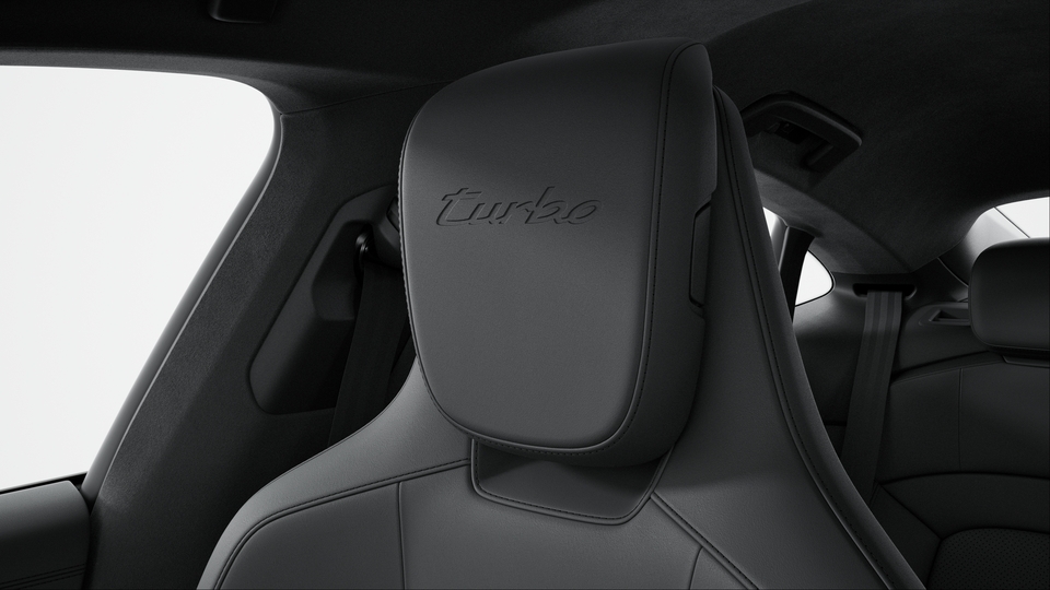 Headrests with embossed model designation front