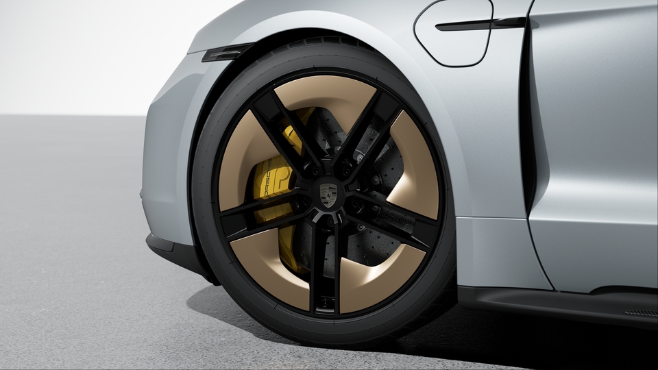 21-inch Taycan Exclusive Design Wheels fully painted in Black (high-gloss) with Aeroblades