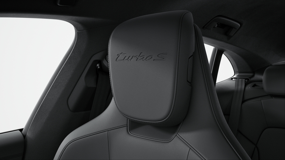 Headrests with embossed model designation front