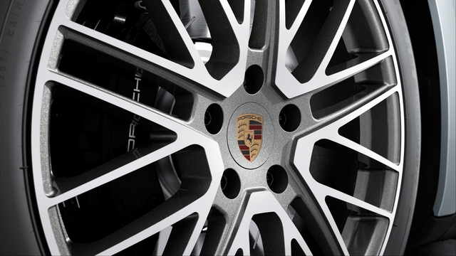 Centros de rueda con escudo Porsche a color