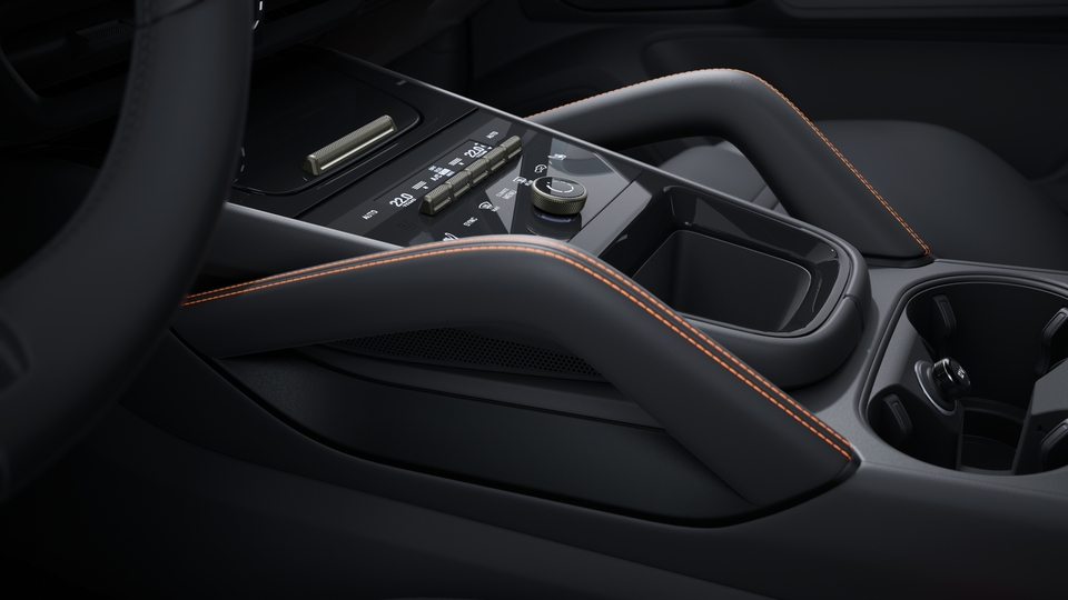 Extended trim package with grab handles leather with coloured decorative stitching