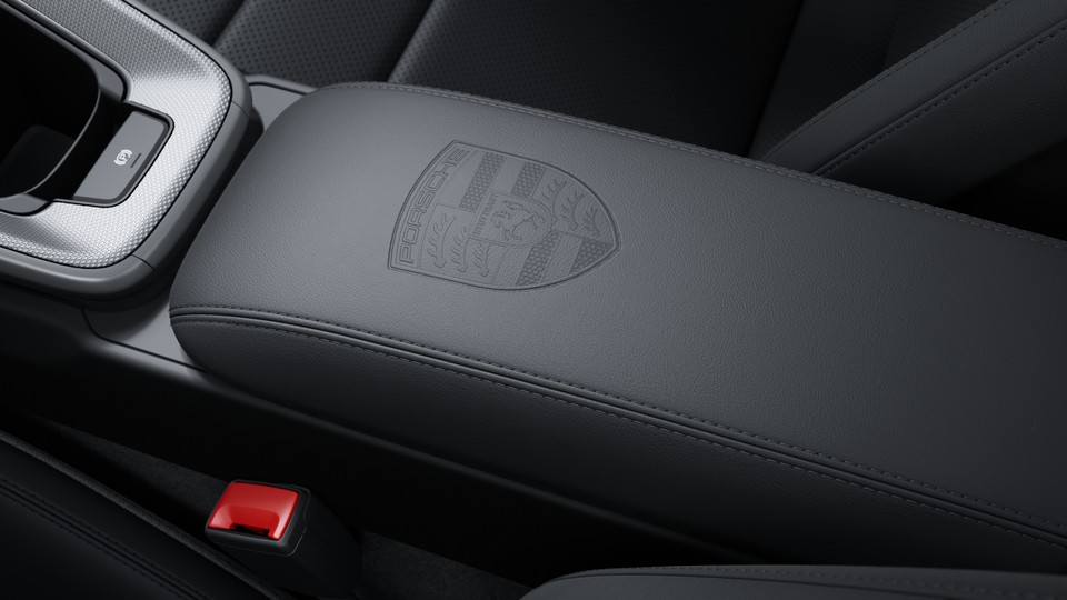 Porsche crest on storage compartment lid
