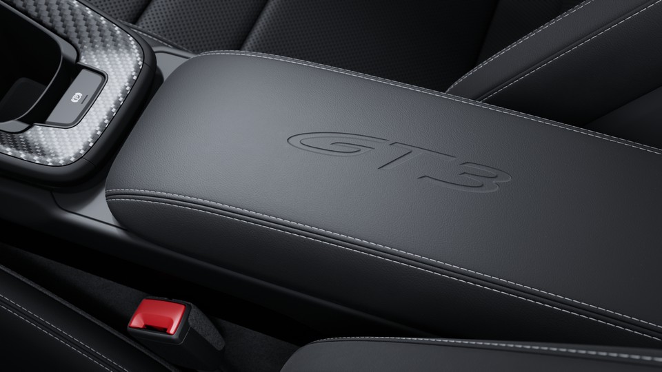 Model Logo embossed on Centre Console Armrests