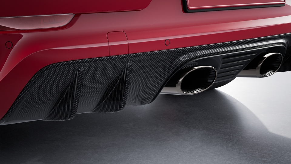 Sports exhaust system with central tailpipes in Dark Bronze