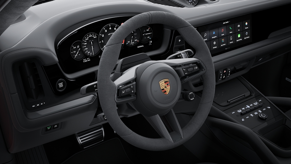 Heated multifunction GT Sports steering wheel in Race-Tex with inlay in carbon