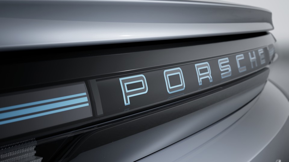 Tónovaný pruh zadních světel s nápisem „PORSCHE“ v barvě Glacier Iceblue