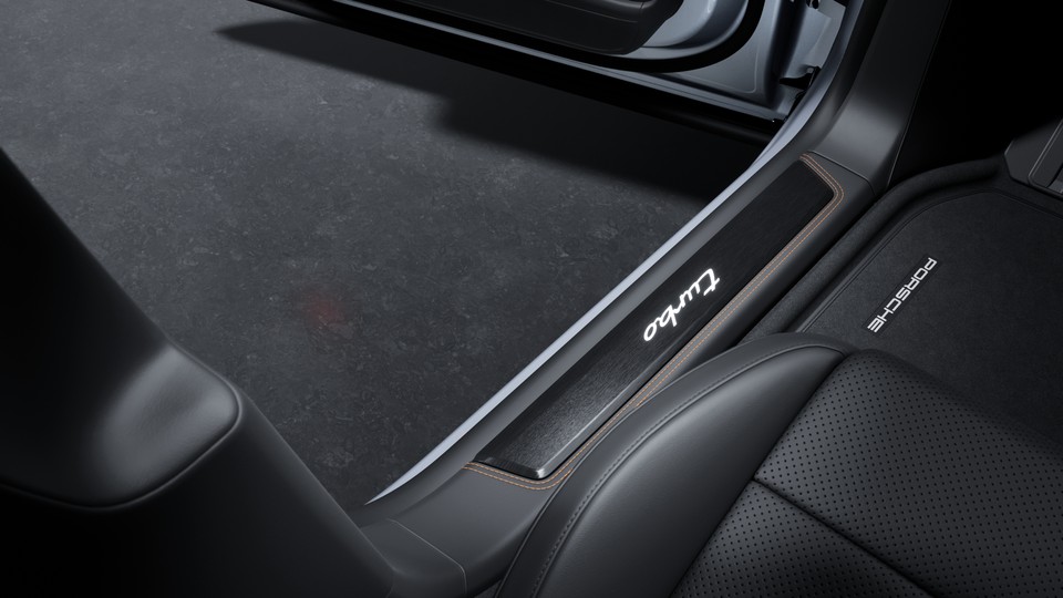 Door sill guards brushed aluminium in Black, illuminated (in conjunction with inner door sill guards in leather)