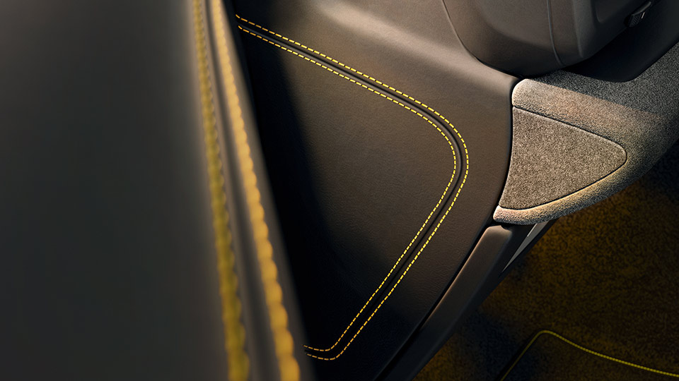 Dashboard End Trims in Leather with Deviated Stitching